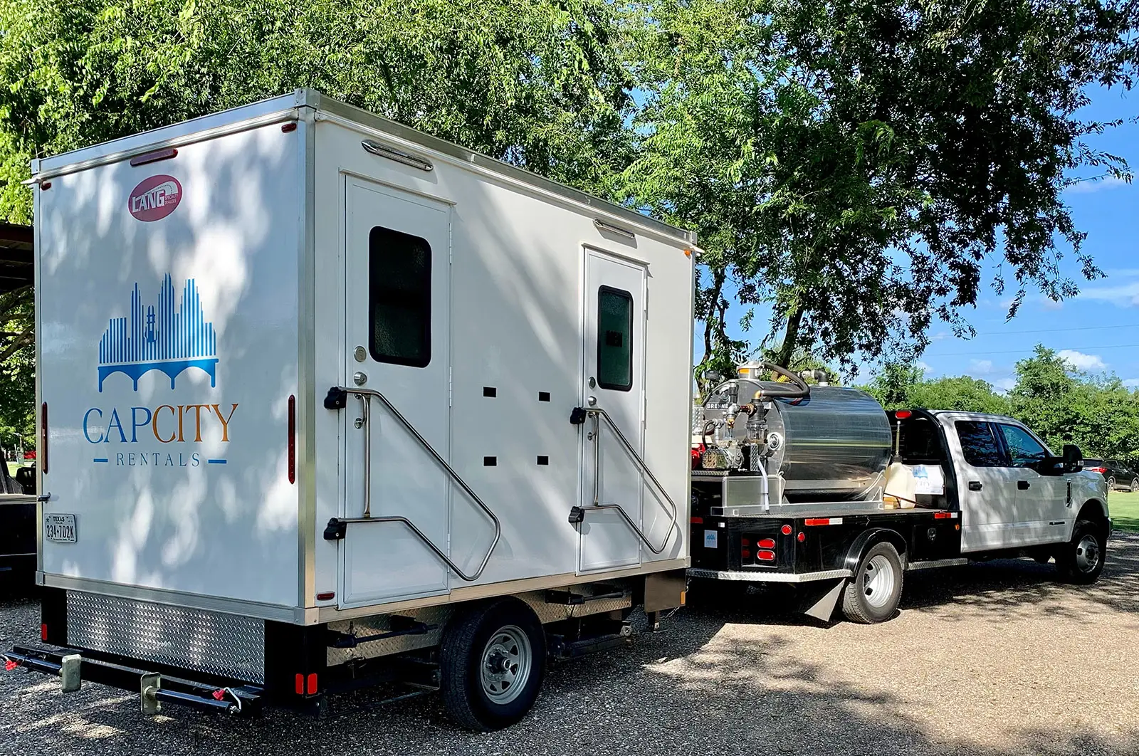 Cap City Rentals restroom trailer and pump truck ready for delivery